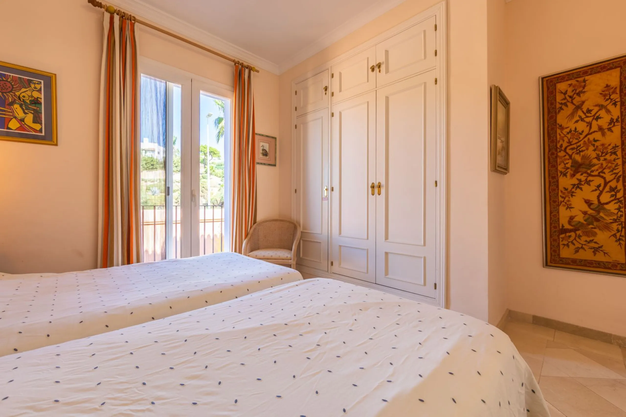 Stunning mid-floor apartment in the first line of the beach, with spectacular views of the sea, the beach, Gibraltar, and Africa, located in the exclusive Bay of Casares next to a protected historic area with an ancient Arab tower, within the prestigious 