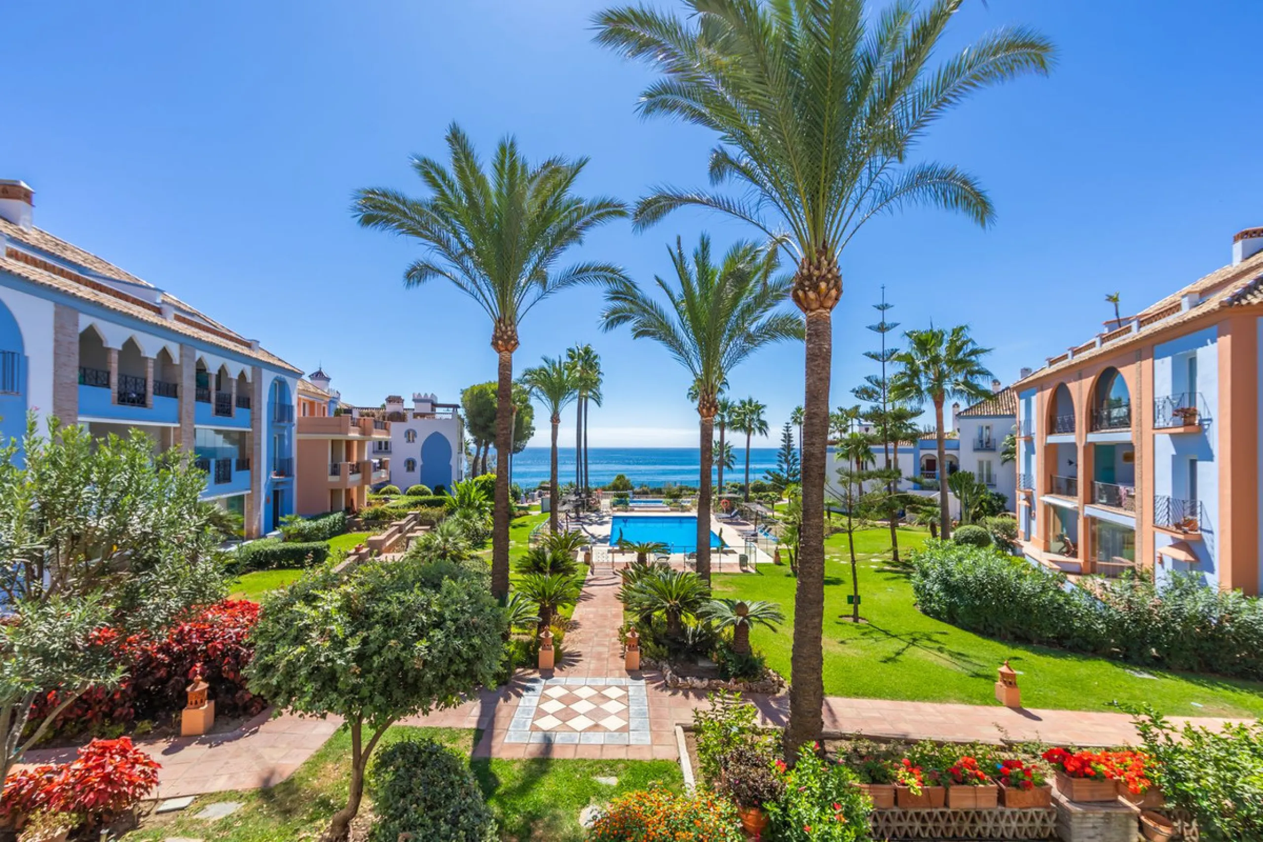 Stunning mid-floor apartment in the first line of the beach, with spectacular views of the sea, the beach, Gibraltar, and Africa, located in the exclusive Bay of Casares next to a protected historic area with an ancient Arab tower, within the prestigious 