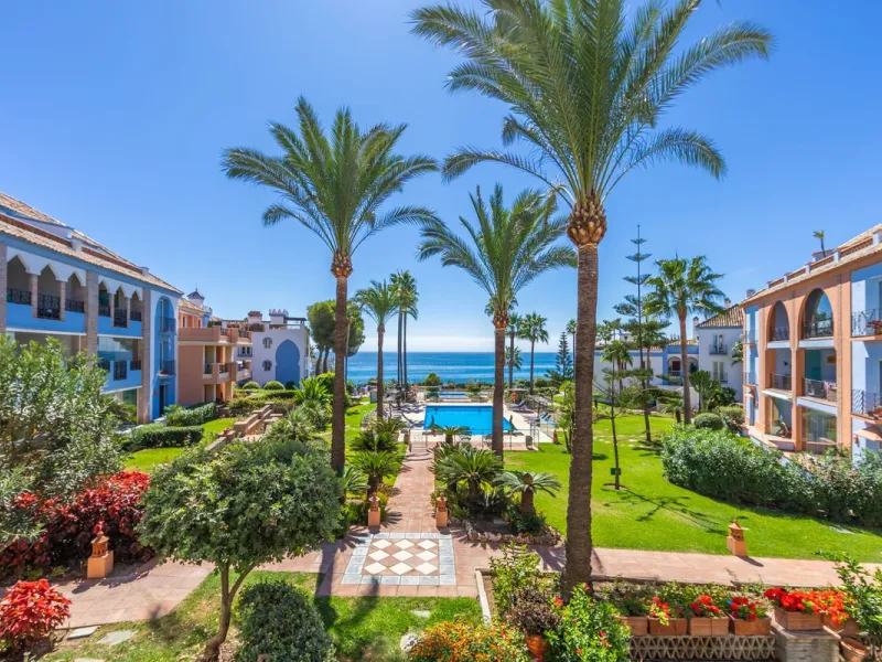 Stunning mid-floor apartment in the first line of the beach, with spectacular views of the sea, the beach, Gibraltar, and Africa, located in the exclusive Bay of Casares next to a protected historic area with an ancient Arab tower, within the prestigious 