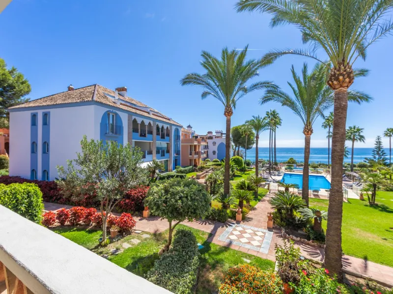 Stunning mid-floor apartment in the first line of the beach, with spectacular views of the sea, the beach, Gibraltar, and Africa, located in the exclusive Bay of Casares next to a protected historic area with an ancient Arab tower, within the prestigious 