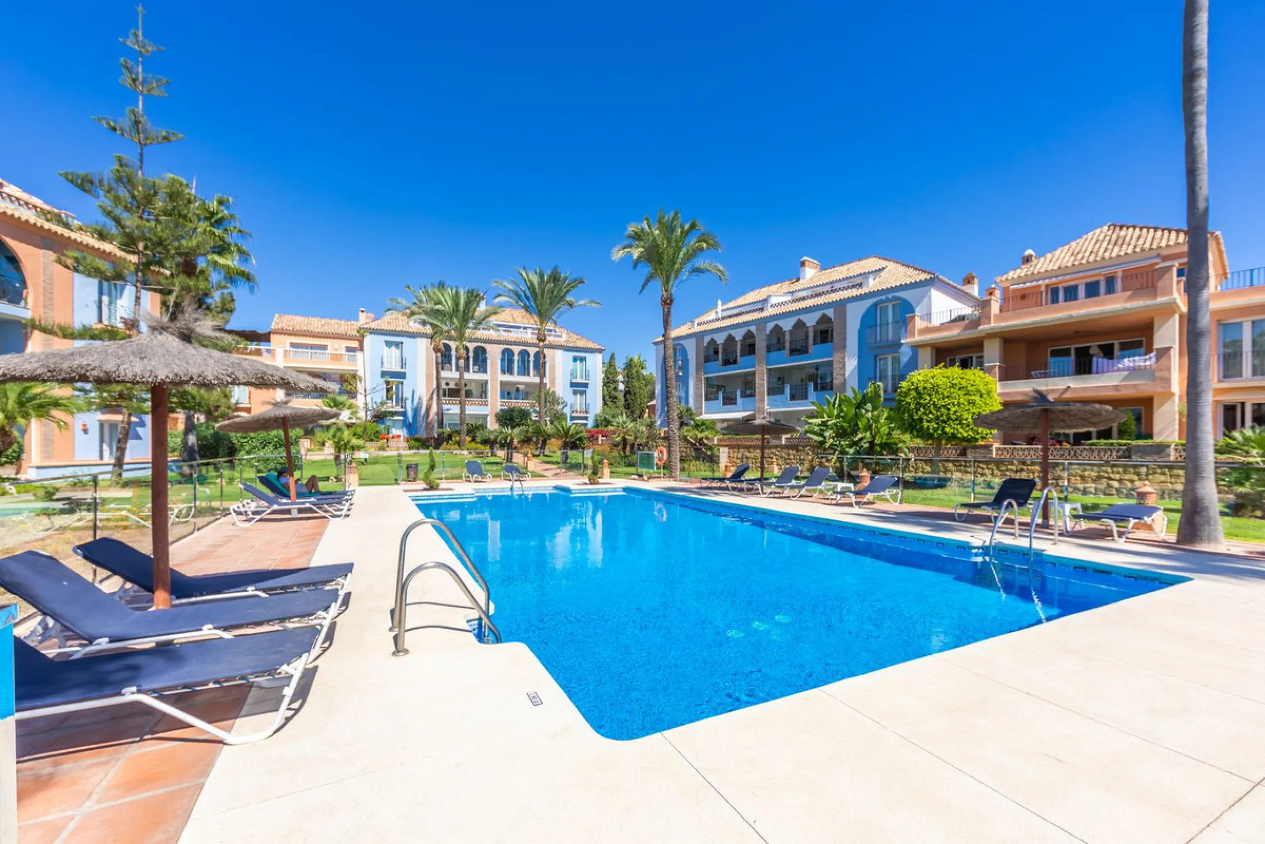 Stunning mid-floor apartment in the first line of the beach, with spectacular views of the sea, the beach, Gibraltar, and Africa, located in the exclusive Bay of Casares next to a protected historic area with an ancient Arab tower, within the prestigious 