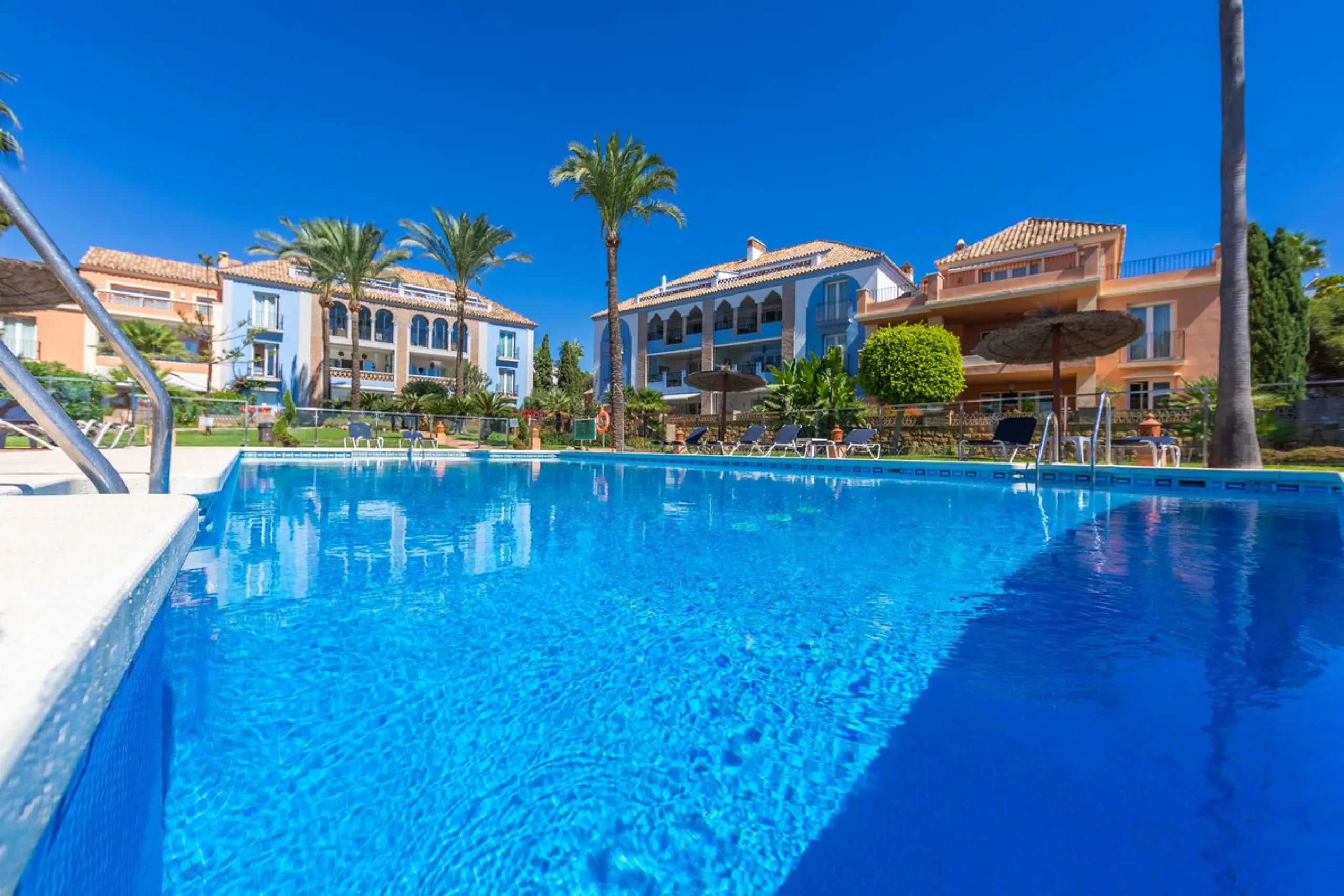 Stunning mid-floor apartment in the first line of the beach, with spectacular views of the sea, the beach, Gibraltar, and Africa, located in the exclusive Bay of Casares next to a protected historic area with an ancient Arab tower, within the prestigious 