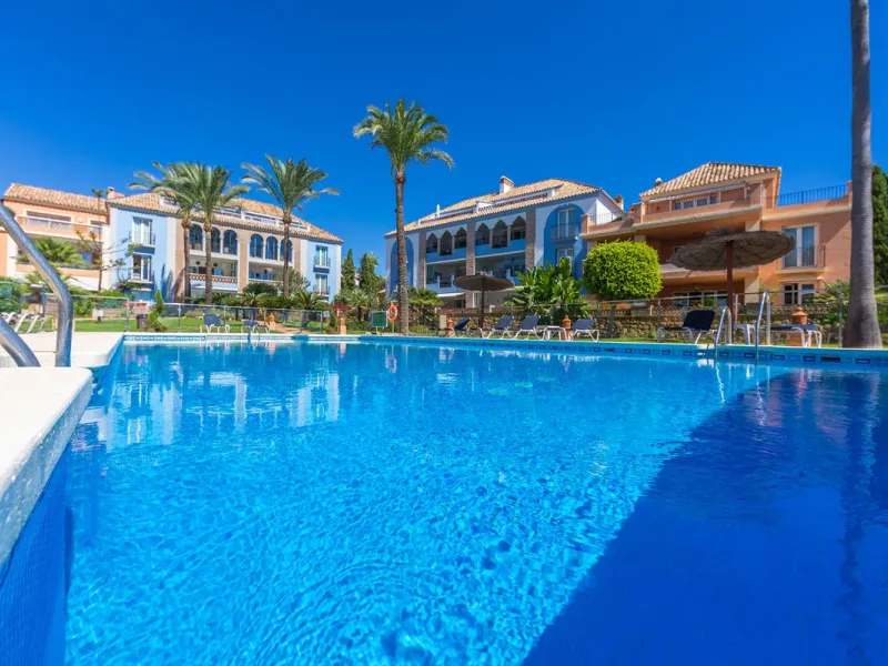 Stunning mid-floor apartment in the first line of the beach, with spectacular views of the sea, the beach, Gibraltar, and Africa, located in the exclusive Bay of Casares next to a protected historic area with an ancient Arab tower, within the prestigious 