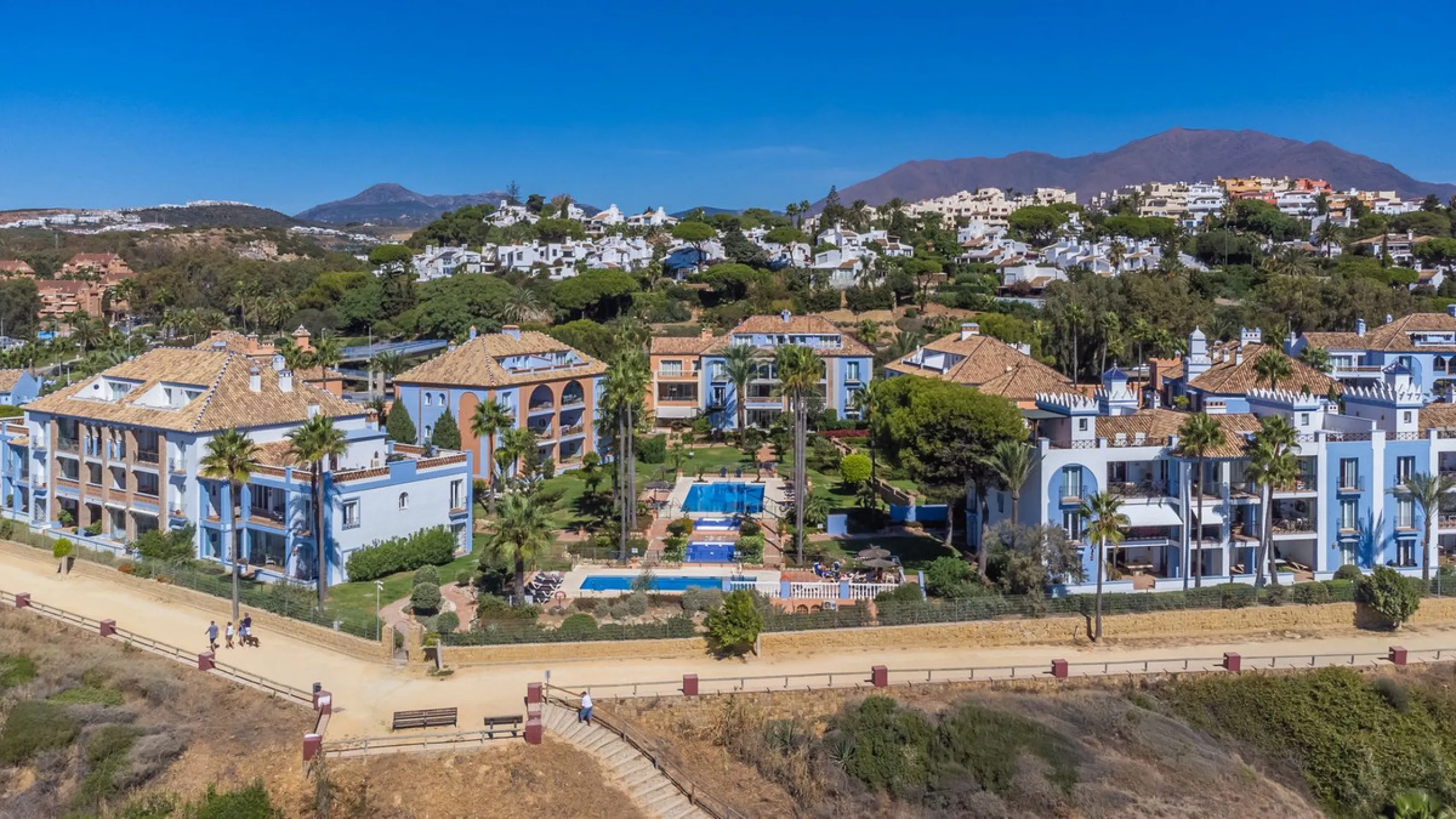 Stunning mid-floor apartment in the first line of the beach, with spectacular views of the sea, the beach, Gibraltar, and Africa, located in the exclusive Bay of Casares next to a protected historic area with an ancient Arab tower, within the prestigious 