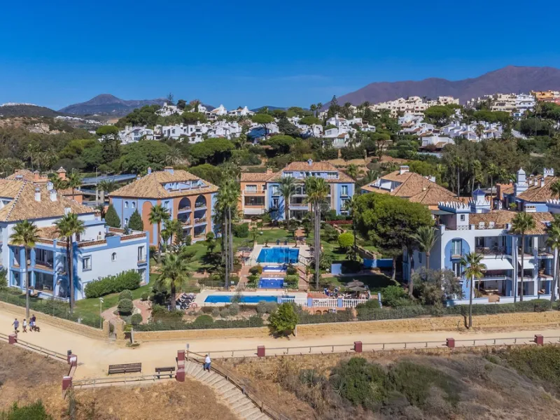 Stunning mid-floor apartment in the first line of the beach, with spectacular views of the sea, the beach, Gibraltar, and Africa, located in the exclusive Bay of Casares next to a protected historic area with an ancient Arab tower, within the prestigious 
