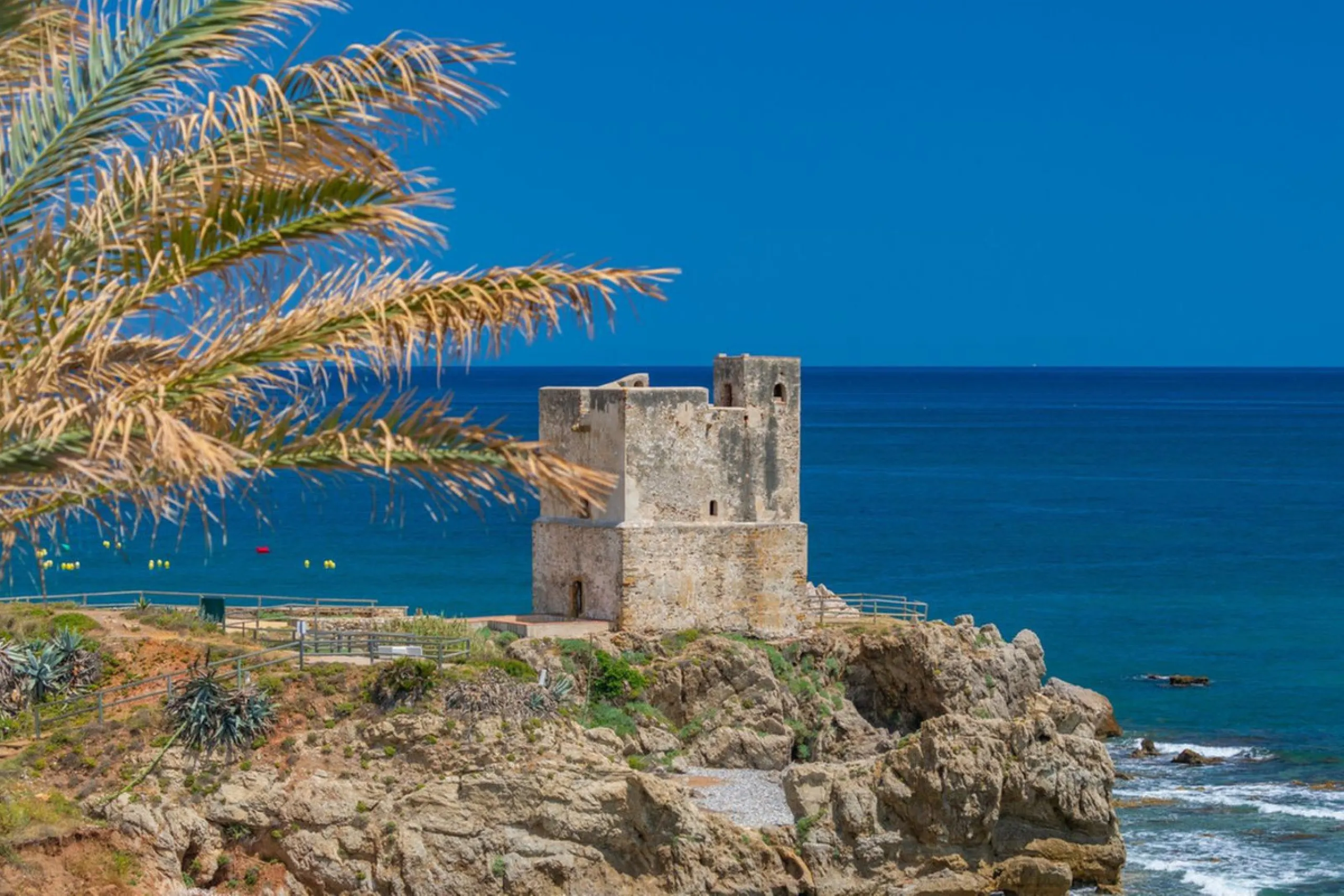 Stunning mid-floor apartment in the first line of the beach, with spectacular views of the sea, the beach, Gibraltar, and Africa, located in the exclusive Bay of Casares next to a protected historic area with an ancient Arab tower, within the prestigious 
