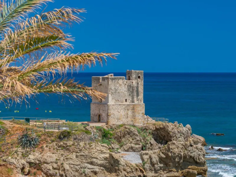 Stunning mid-floor apartment in the first line of the beach, with spectacular views of the sea, the beach, Gibraltar, and Africa, located in the exclusive Bay of Casares next to a protected historic area with an ancient Arab tower, within the prestigious 