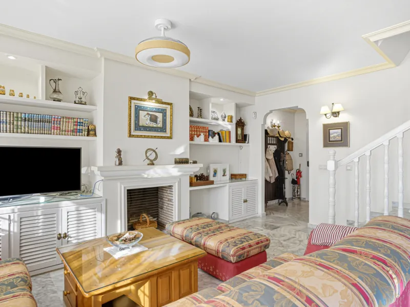 This three-bedroom, south-facing townhouse is set in the sought-after gated community of El Capricho on Marbella's Golden Mile is bursting with potential, offering spacious tropical gardens and two communal swimming pools. Ideally located within walking d
