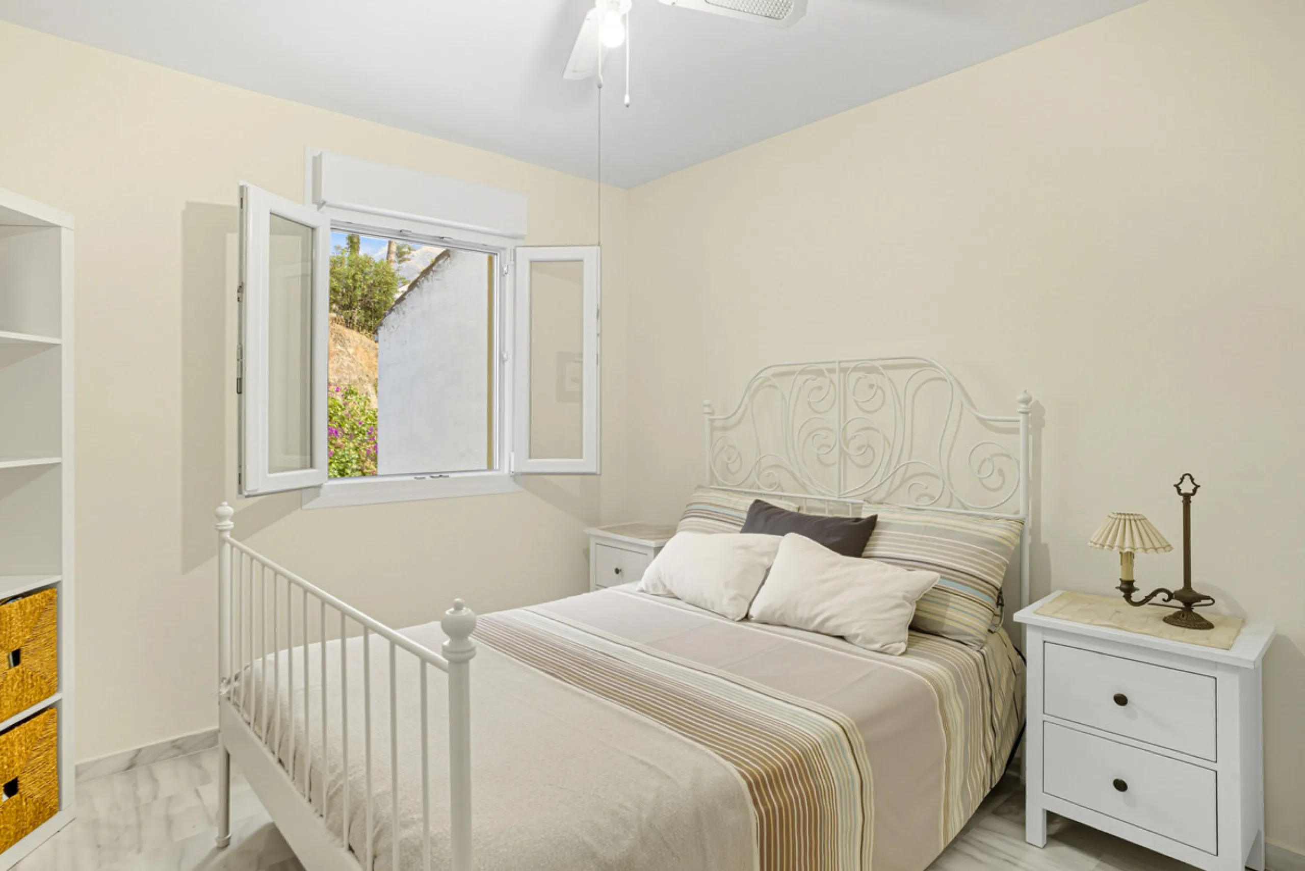 This three-bedroom, south-facing townhouse is set in the sought-after gated community of El Capricho on Marbella's Golden Mile is bursting with potential, offering spacious tropical gardens and two communal swimming pools. Ideally located within walking d