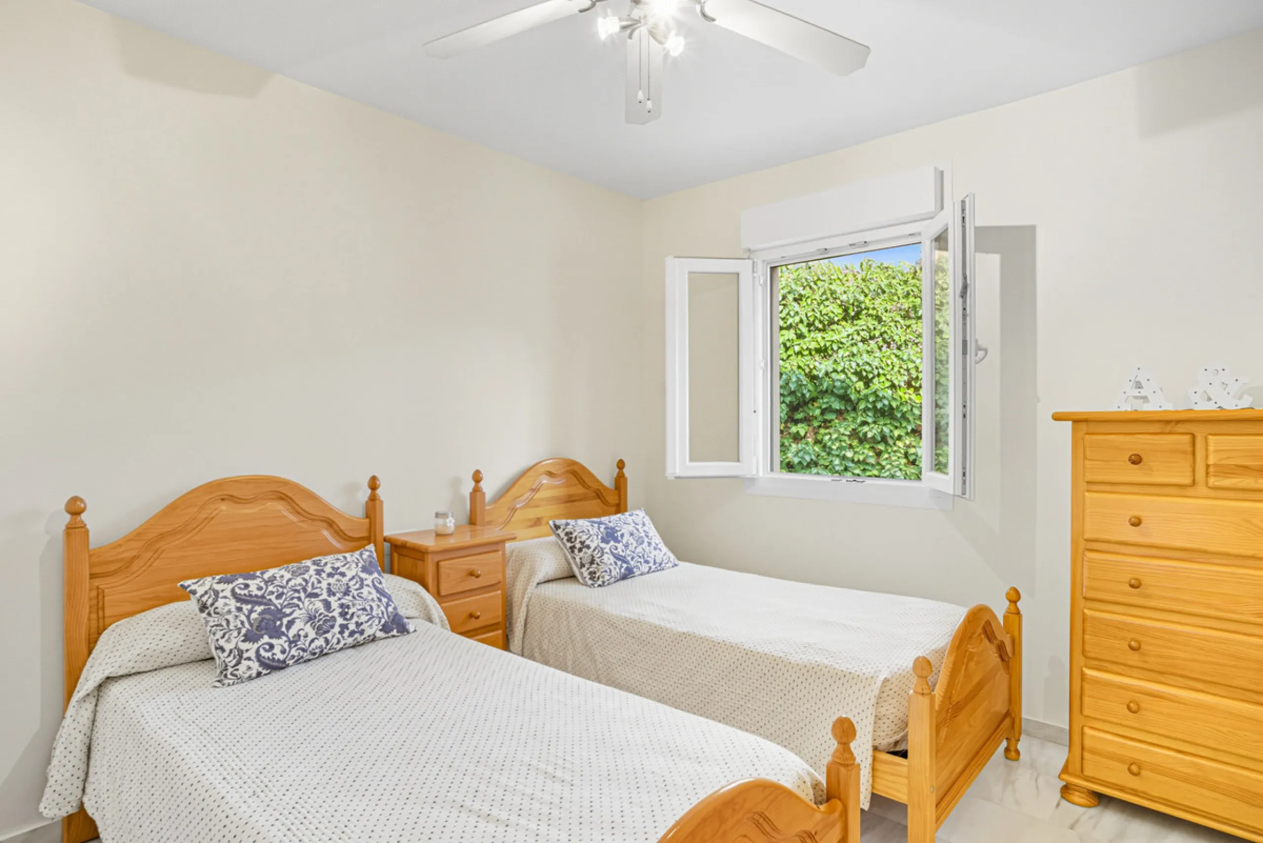 This three-bedroom, south-facing townhouse is set in the sought-after gated community of El Capricho on Marbella's Golden Mile is bursting with potential, offering spacious tropical gardens and two communal swimming pools. Ideally located within walking d