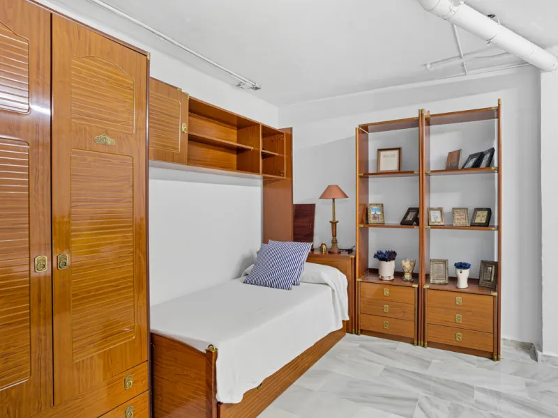 This three-bedroom, south-facing townhouse is set in the sought-after gated community of El Capricho on Marbella's Golden Mile is bursting with potential, offering spacious tropical gardens and two communal swimming pools. Ideally located within walking d