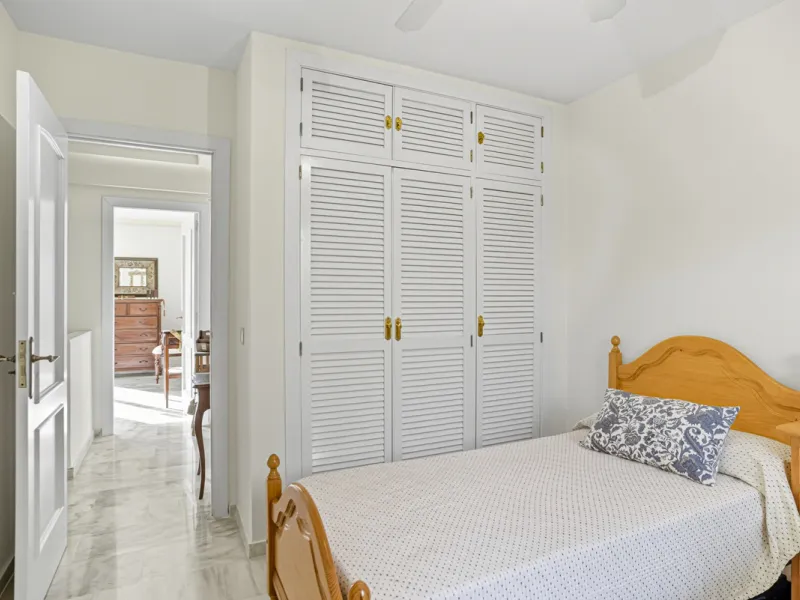 This three-bedroom, south-facing townhouse is set in the sought-after gated community of El Capricho on Marbella's Golden Mile is bursting with potential, offering spacious tropical gardens and two communal swimming pools. Ideally located within walking d