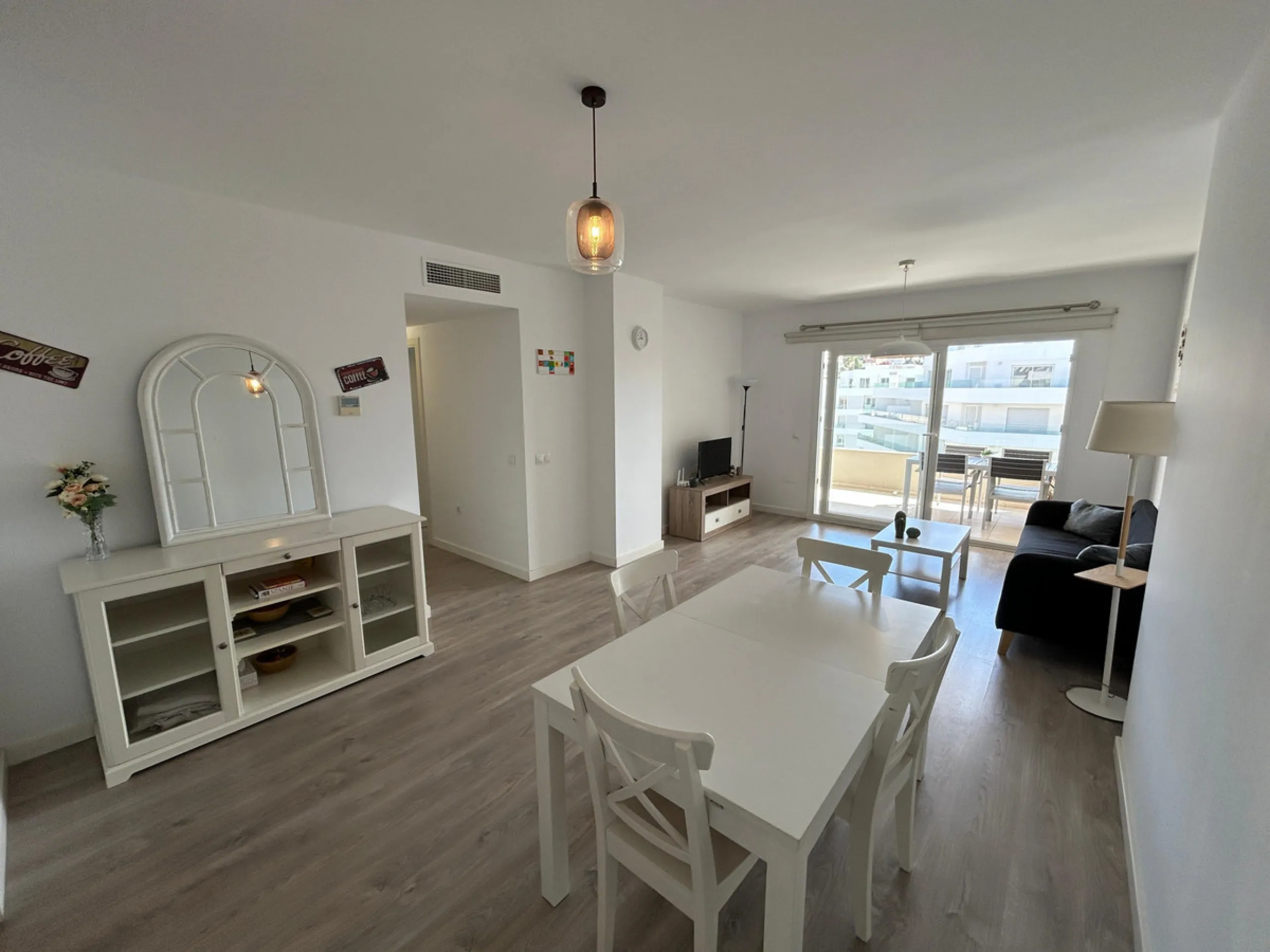 This refined apartment in Nueva Andalucía offers the perfect balance between comfort, style and convenience. Situated on the 6th floor, the property enjoys open sea and mountain views, enhancing the sense of space and light throughout the home. With 3 spa