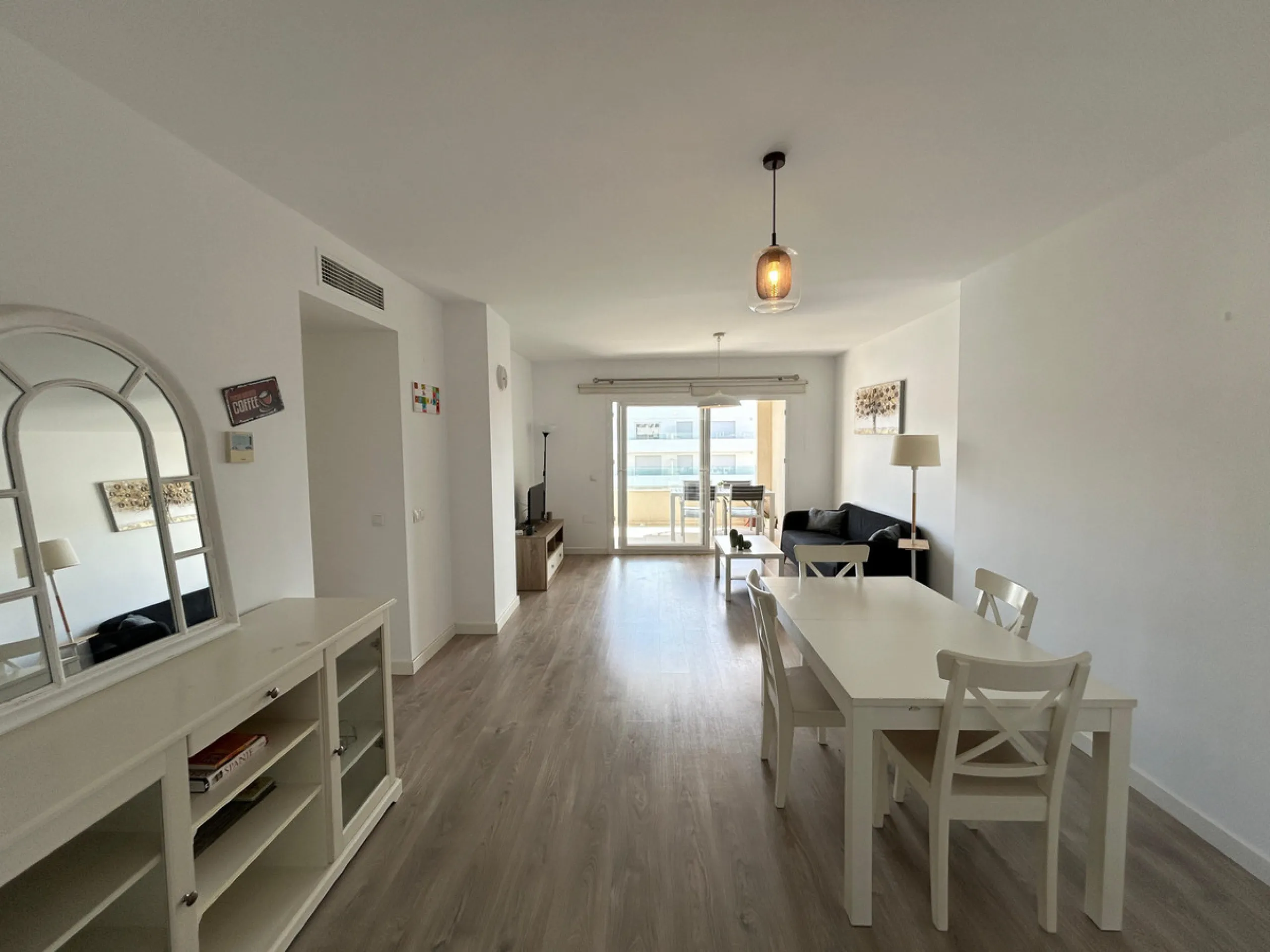 This refined apartment in Nueva Andalucía offers the perfect balance between comfort, style and convenience. Situated on the 6th floor, the property enjoys open sea and mountain views, enhancing the sense of space and light throughout the home. With 3 spa