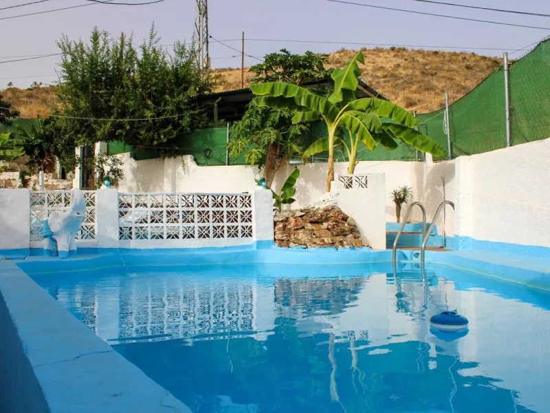 Villa with garden, private pool and three large terraces with sea views.