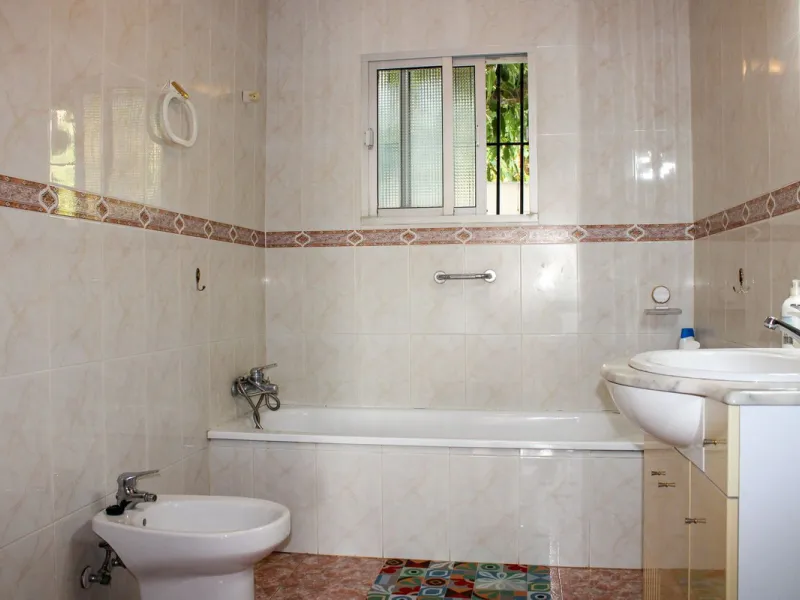 Villa with garden, private pool and three large terraces with sea views.