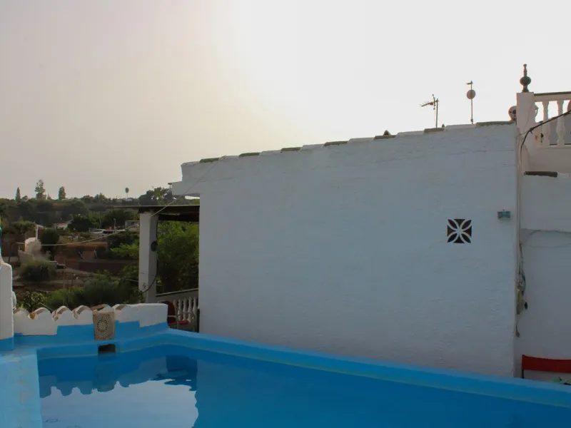 Villa with garden, private pool and three large terraces with sea views.