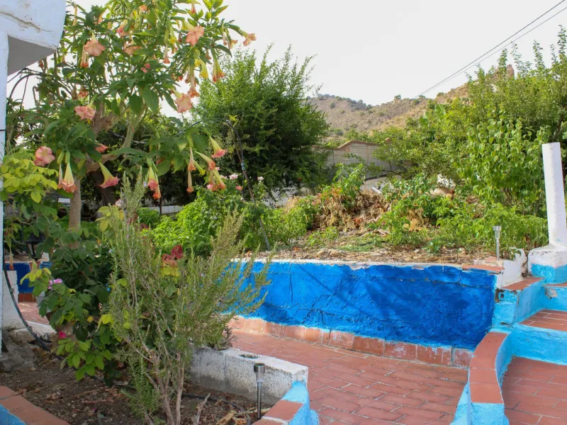 Villa with garden, private pool and three large terraces with sea views.