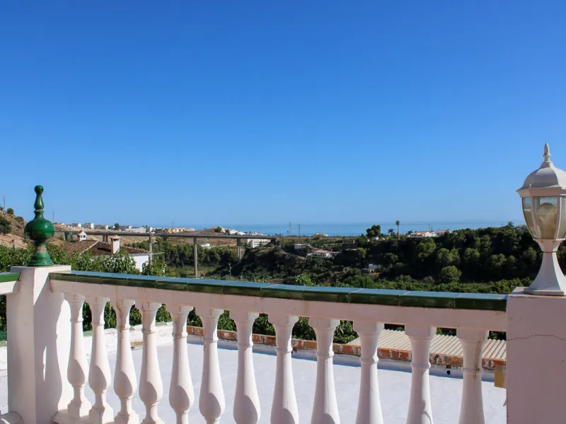 Villa with garden, private pool and three large terraces with sea views.