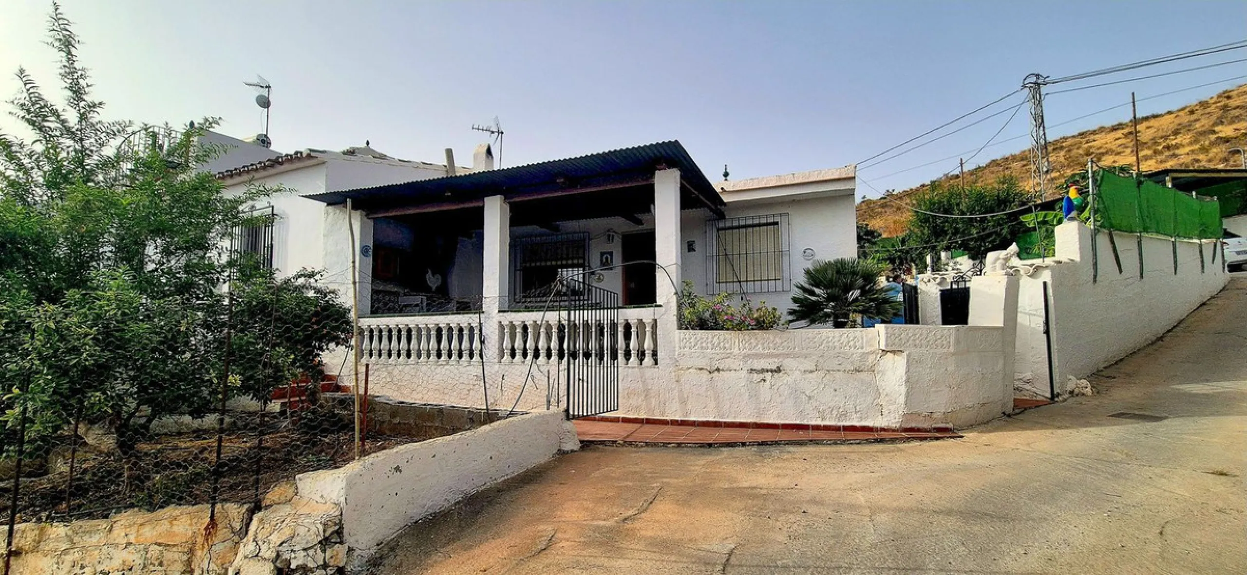 Villa with garden, private pool and three large terraces with sea views.
