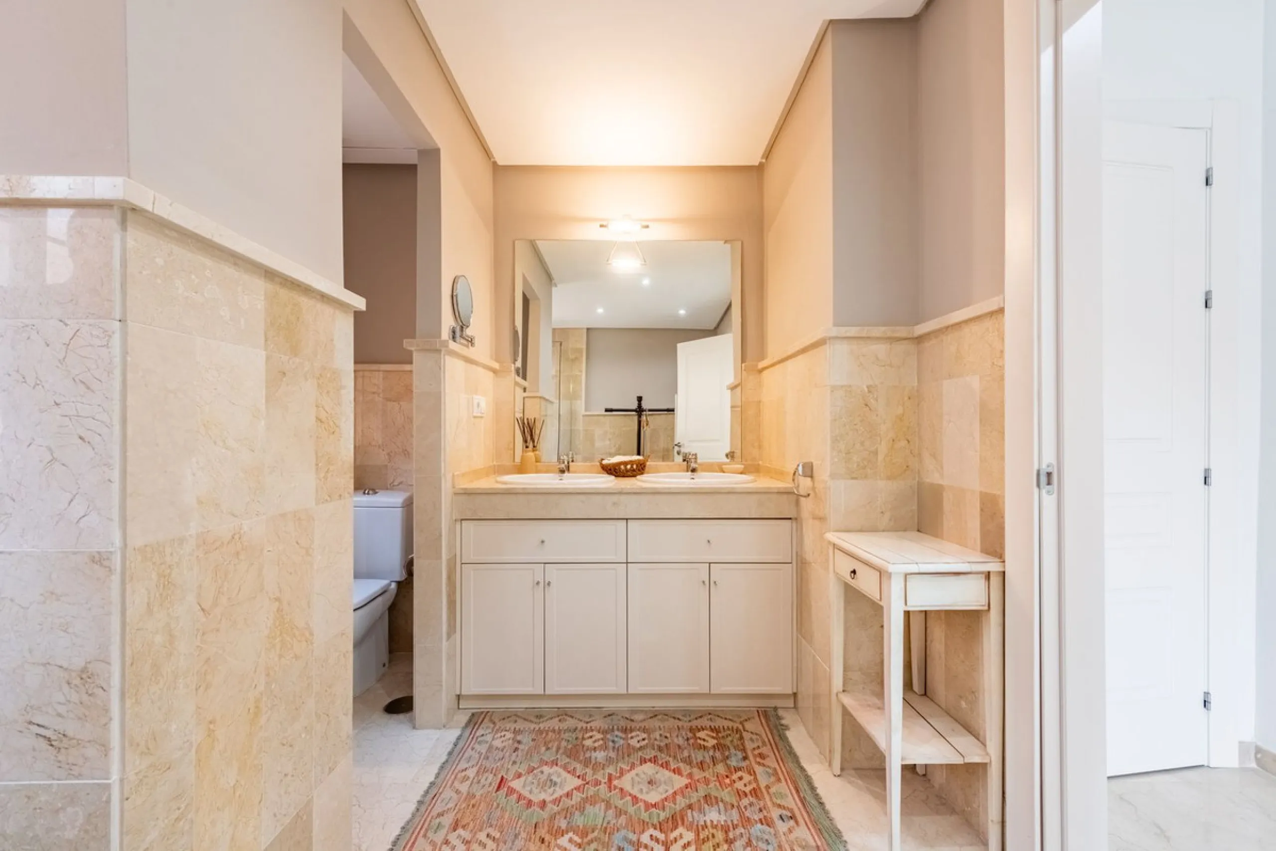 Located within the secure gated community of Oasis de Nagüeles, this beautifully presented semi-detached home offers the perfect blend of comfort, style, and convenience. With three bedrooms, generous living spaces, and a prime location in one of Marbella