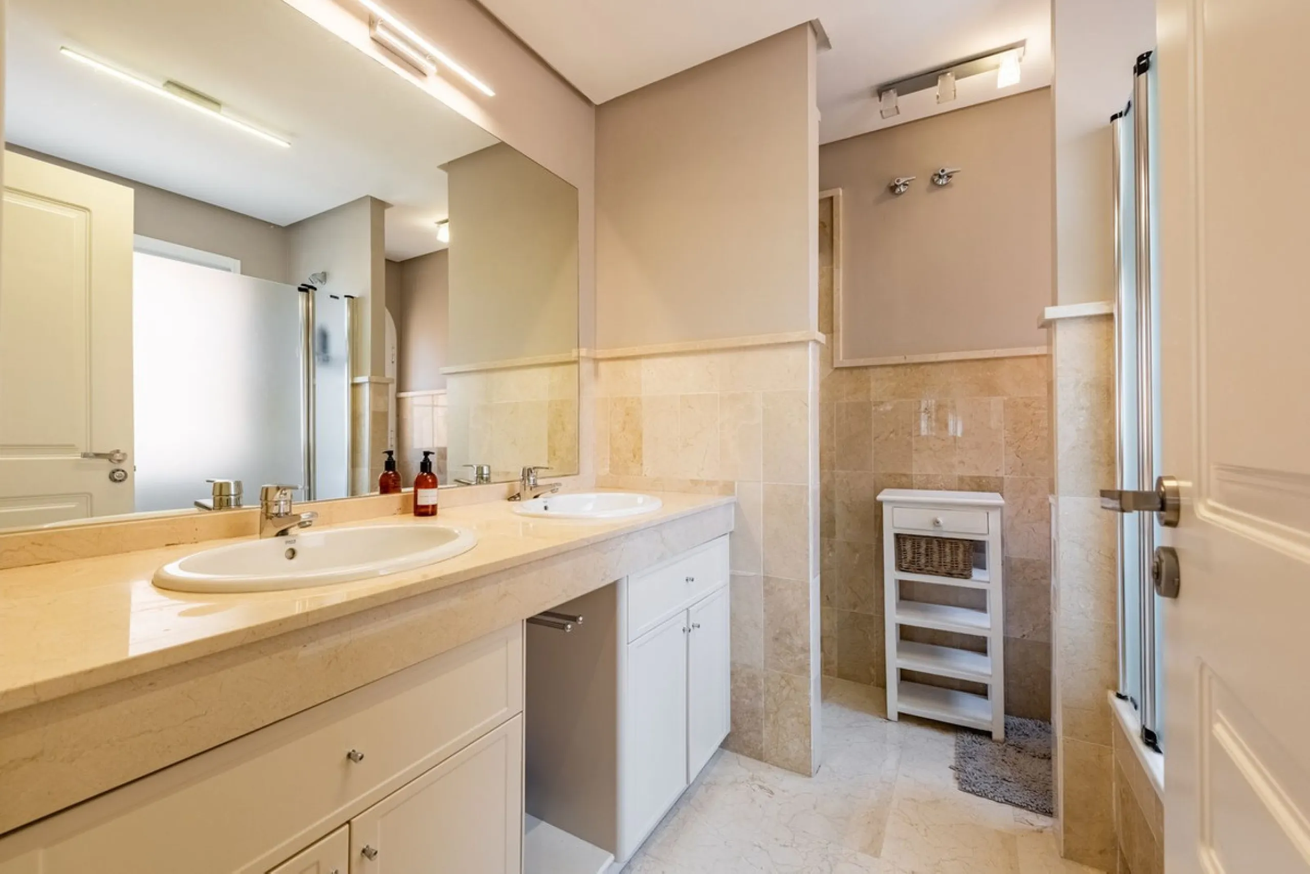 Located within the secure gated community of Oasis de Nagüeles, this beautifully presented semi-detached home offers the perfect blend of comfort, style, and convenience. With three bedrooms, generous living spaces, and a prime location in one of Marbella