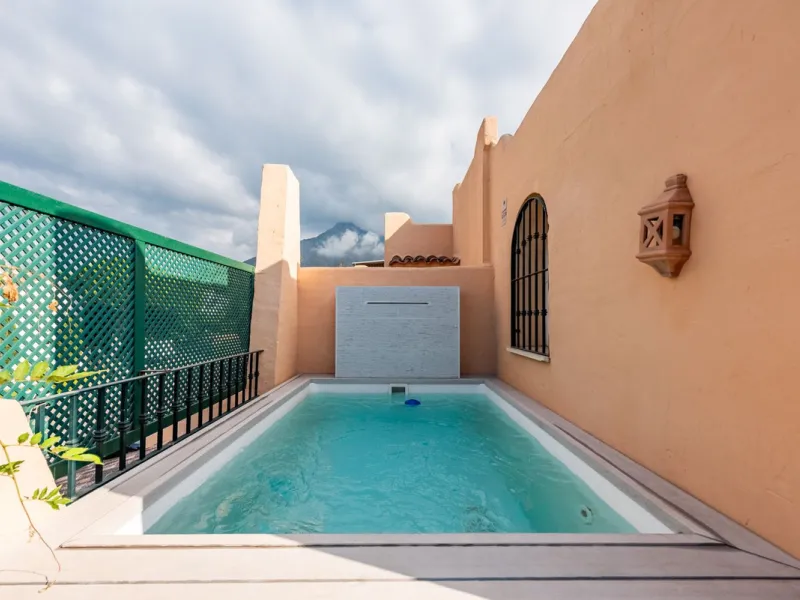 Located within the secure gated community of Oasis de Nagüeles, this beautifully presented semi-detached home offers the perfect blend of comfort, style, and convenience. With three bedrooms, generous living spaces, and a prime location in one of Marbella