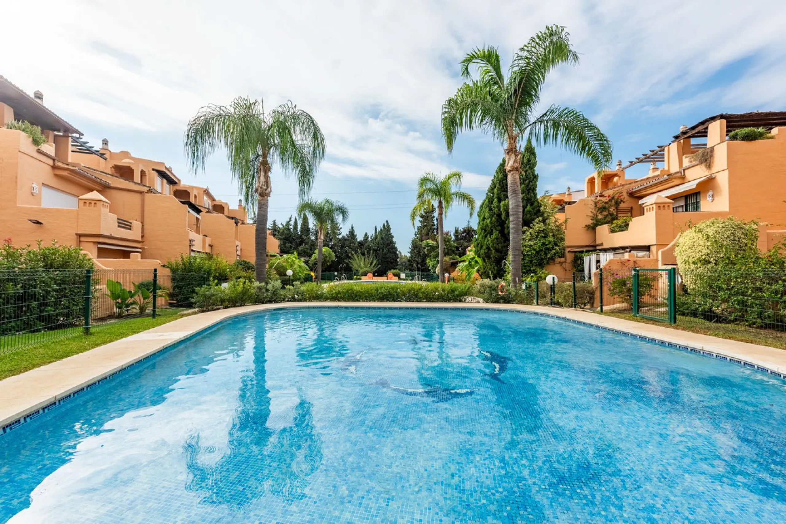 Located within the secure gated community of Oasis de Nagüeles, this beautifully presented semi-detached home offers the perfect blend of comfort, style, and convenience. With three bedrooms, generous living spaces, and a prime location in one of Marbella