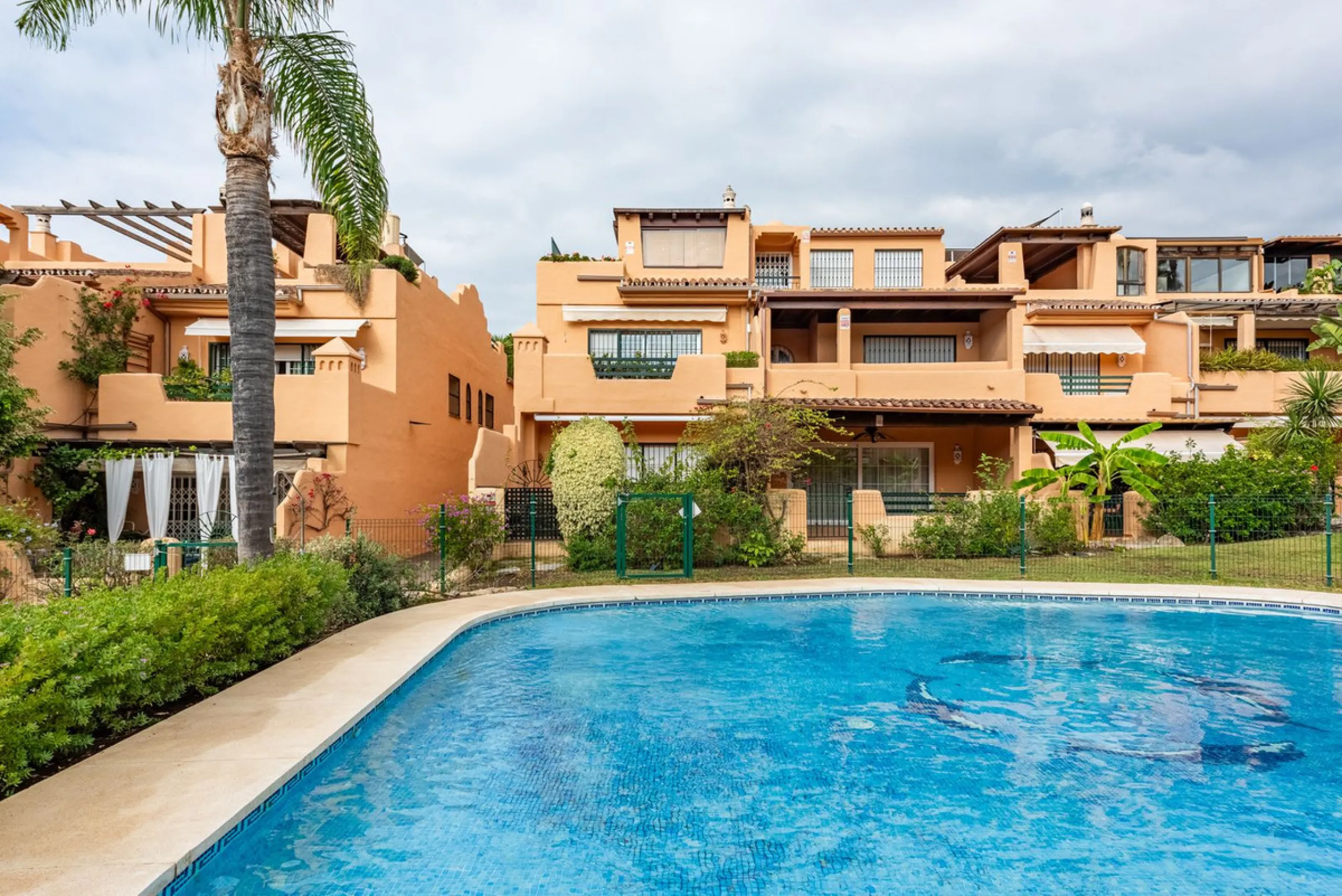Located within the secure gated community of Oasis de Nagüeles, this beautifully presented semi-detached home offers the perfect blend of comfort, style, and convenience. With three bedrooms, generous living spaces, and a prime location in one of Marbella
