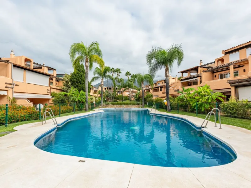 Located within the secure gated community of Oasis de Nagüeles, this beautifully presented semi-detached home offers the perfect blend of comfort, style, and convenience. With three bedrooms, generous living spaces, and a prime location in one of Marbella
