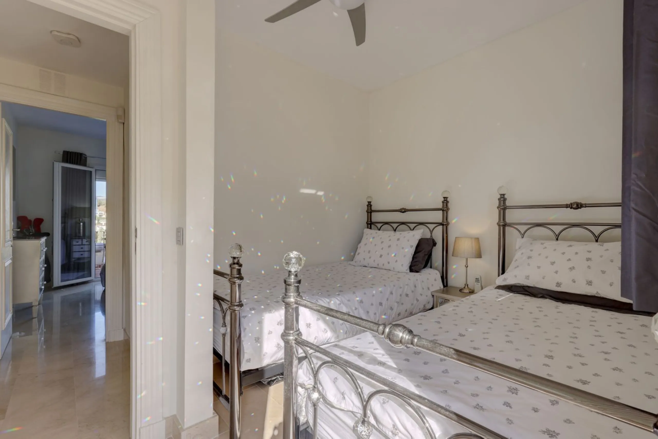 A beautiful South West facing 3 bedroom 2 bathroom duplex penthouse with open golf views and lots of natural light throughout.
