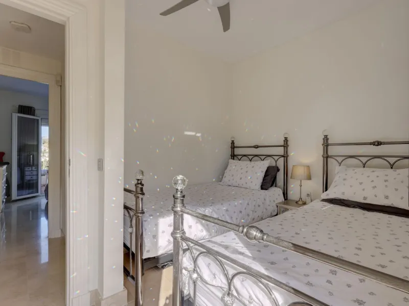 A beautiful South West facing 3 bedroom 2 bathroom duplex penthouse with open golf views and lots of natural light throughout.
