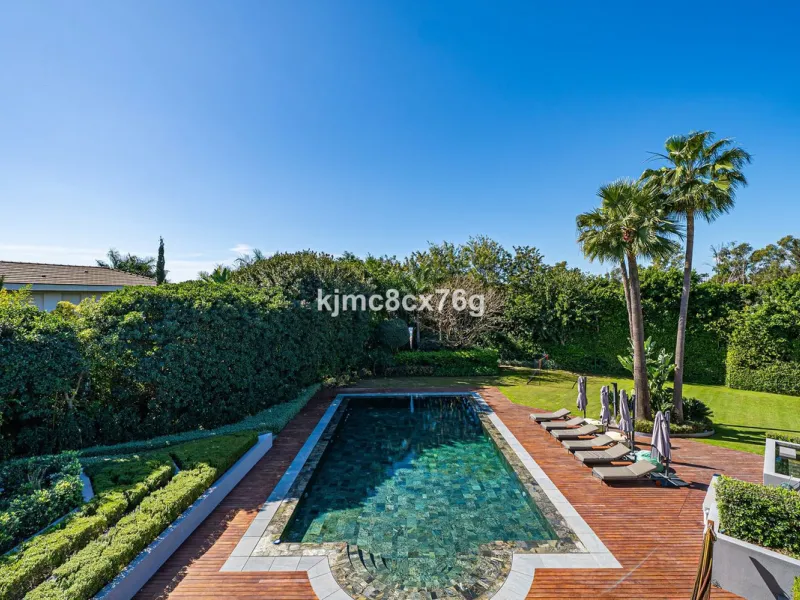 Located in the prestigious Guadalmina area, this exceptional villa seamlessly blends modern elegance with the serenity of a golf-front retreat. Just moments from world-class courses, golden beaches, and upscale amenities, it offers the perfect balance of 