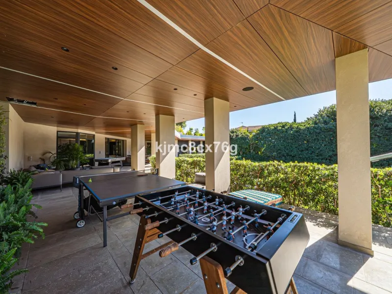 Located in the prestigious Guadalmina area, this exceptional villa seamlessly blends modern elegance with the serenity of a golf-front retreat. Just moments from world-class courses, golden beaches, and upscale amenities, it offers the perfect balance of 