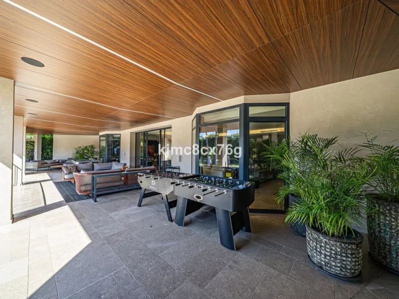Located in the prestigious Guadalmina area, this exceptional villa seamlessly blends modern elegance with the serenity of a golf-front retreat. Just moments from world-class courses, golden beaches, and upscale amenities, it offers the perfect balance of 