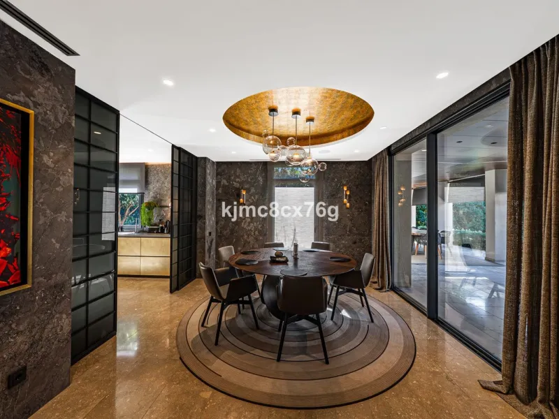 Located in the prestigious Guadalmina area, this exceptional villa seamlessly blends modern elegance with the serenity of a golf-front retreat. Just moments from world-class courses, golden beaches, and upscale amenities, it offers the perfect balance of 