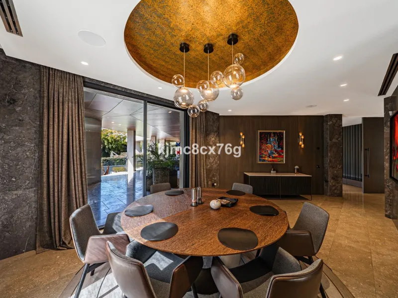 Located in the prestigious Guadalmina area, this exceptional villa seamlessly blends modern elegance with the serenity of a golf-front retreat. Just moments from world-class courses, golden beaches, and upscale amenities, it offers the perfect balance of 