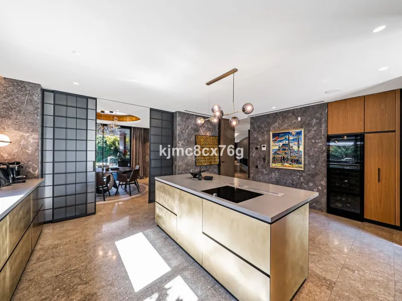 Located in the prestigious Guadalmina area, this exceptional villa seamlessly blends modern elegance with the serenity of a golf-front retreat. Just moments from world-class courses, golden beaches, and upscale amenities, it offers the perfect balance of 