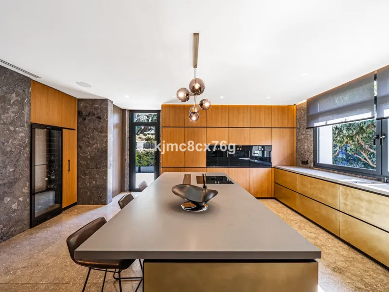 Located in the prestigious Guadalmina area, this exceptional villa seamlessly blends modern elegance with the serenity of a golf-front retreat. Just moments from world-class courses, golden beaches, and upscale amenities, it offers the perfect balance of 