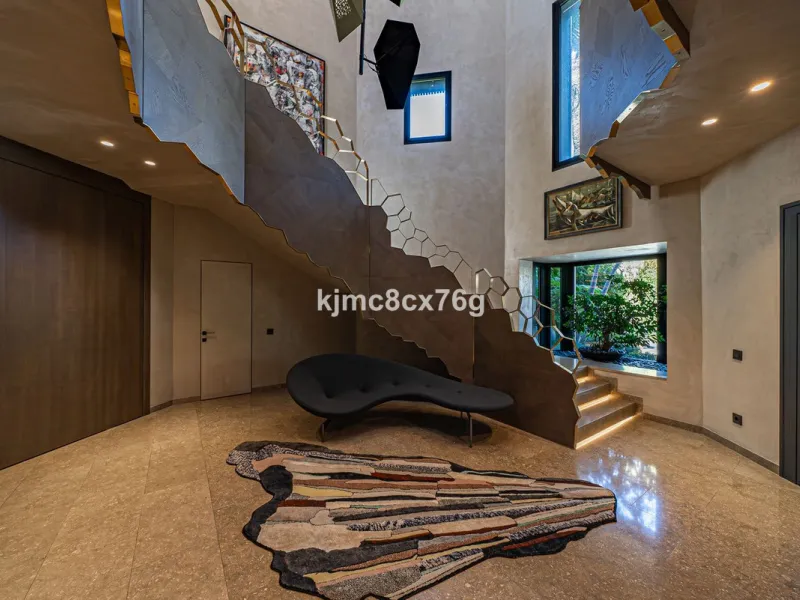 Located in the prestigious Guadalmina area, this exceptional villa seamlessly blends modern elegance with the serenity of a golf-front retreat. Just moments from world-class courses, golden beaches, and upscale amenities, it offers the perfect balance of 