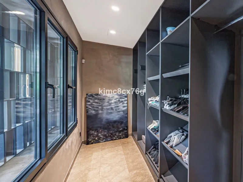 Located in the prestigious Guadalmina area, this exceptional villa seamlessly blends modern elegance with the serenity of a golf-front retreat. Just moments from world-class courses, golden beaches, and upscale amenities, it offers the perfect balance of 