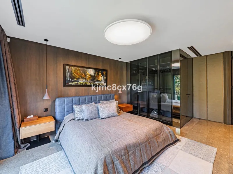 Located in the prestigious Guadalmina area, this exceptional villa seamlessly blends modern elegance with the serenity of a golf-front retreat. Just moments from world-class courses, golden beaches, and upscale amenities, it offers the perfect balance of 