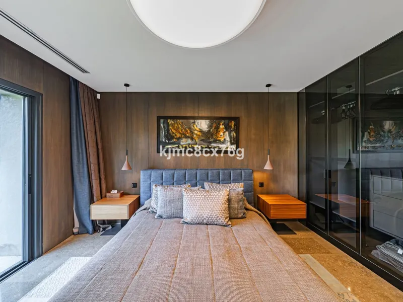 Located in the prestigious Guadalmina area, this exceptional villa seamlessly blends modern elegance with the serenity of a golf-front retreat. Just moments from world-class courses, golden beaches, and upscale amenities, it offers the perfect balance of 