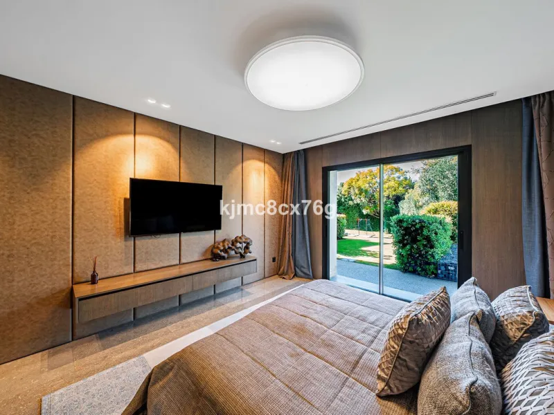 Located in the prestigious Guadalmina area, this exceptional villa seamlessly blends modern elegance with the serenity of a golf-front retreat. Just moments from world-class courses, golden beaches, and upscale amenities, it offers the perfect balance of 