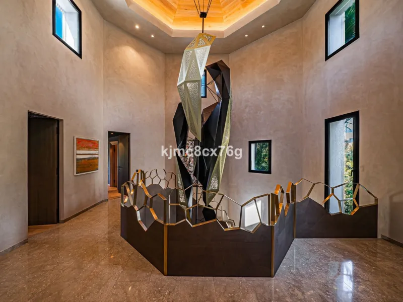 Located in the prestigious Guadalmina area, this exceptional villa seamlessly blends modern elegance with the serenity of a golf-front retreat. Just moments from world-class courses, golden beaches, and upscale amenities, it offers the perfect balance of 