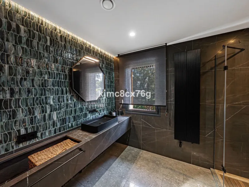 Located in the prestigious Guadalmina area, this exceptional villa seamlessly blends modern elegance with the serenity of a golf-front retreat. Just moments from world-class courses, golden beaches, and upscale amenities, it offers the perfect balance of 