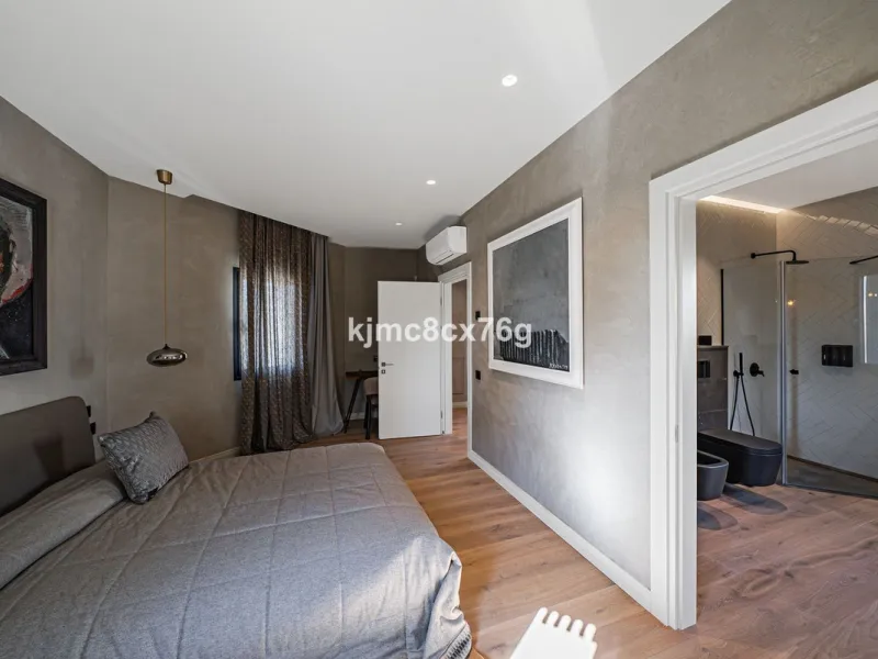 Located in the prestigious Guadalmina area, this exceptional villa seamlessly blends modern elegance with the serenity of a golf-front retreat. Just moments from world-class courses, golden beaches, and upscale amenities, it offers the perfect balance of 