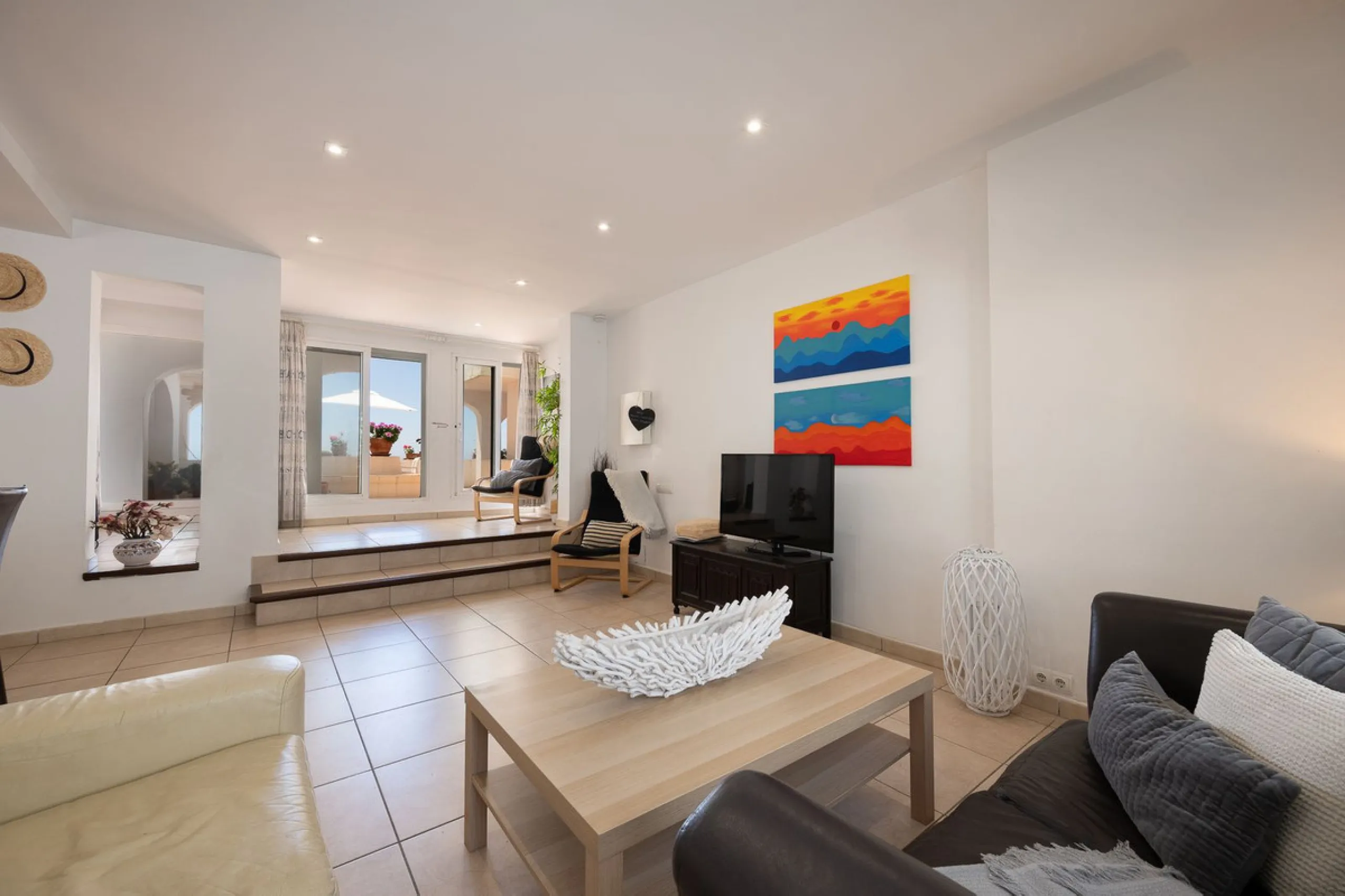 Imagine waking up metres away from the sea in a Front-line Beach apartment. This spacious 3-bedroom, 2-bathroom gem is designed for comfort and convenience, featuring a fully fitted kitchen that flows seamlessly into the open-plan living and dining area. 