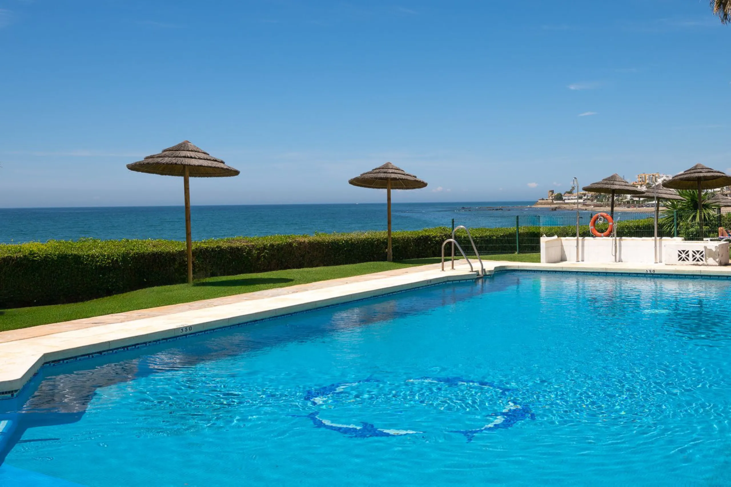 Imagine waking up metres away from the sea in a Front-line Beach apartment. This spacious 3-bedroom, 2-bathroom gem is designed for comfort and convenience, featuring a fully fitted kitchen that flows seamlessly into the open-plan living and dining area. 