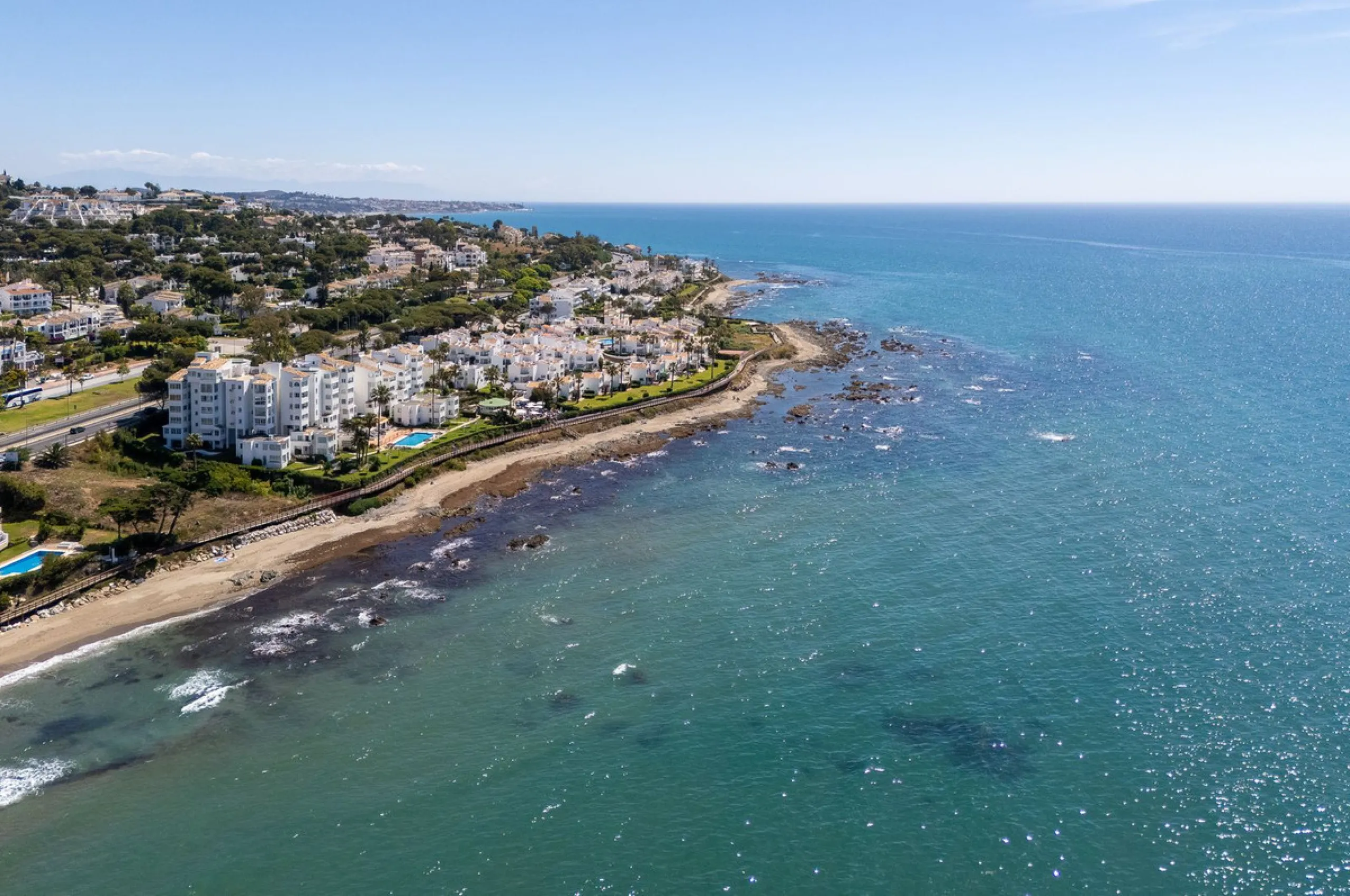 Imagine waking up metres away from the sea in a Front-line Beach apartment. This spacious 3-bedroom, 2-bathroom gem is designed for comfort and convenience, featuring a fully fitted kitchen that flows seamlessly into the open-plan living and dining area. 